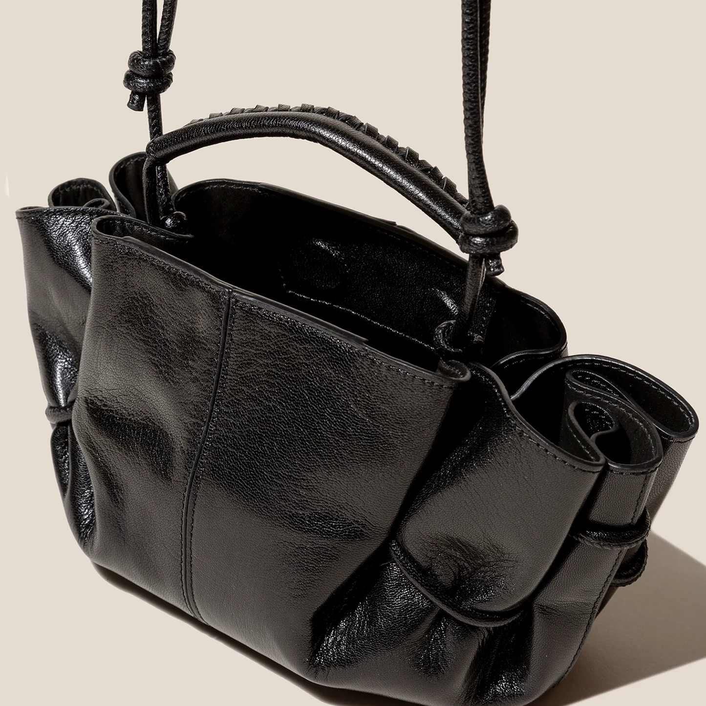 Glossy Jet Black Ruched Side Compact Mini Hand Pouch With Braided Top Grip And Knotted Hanging Carry Cords